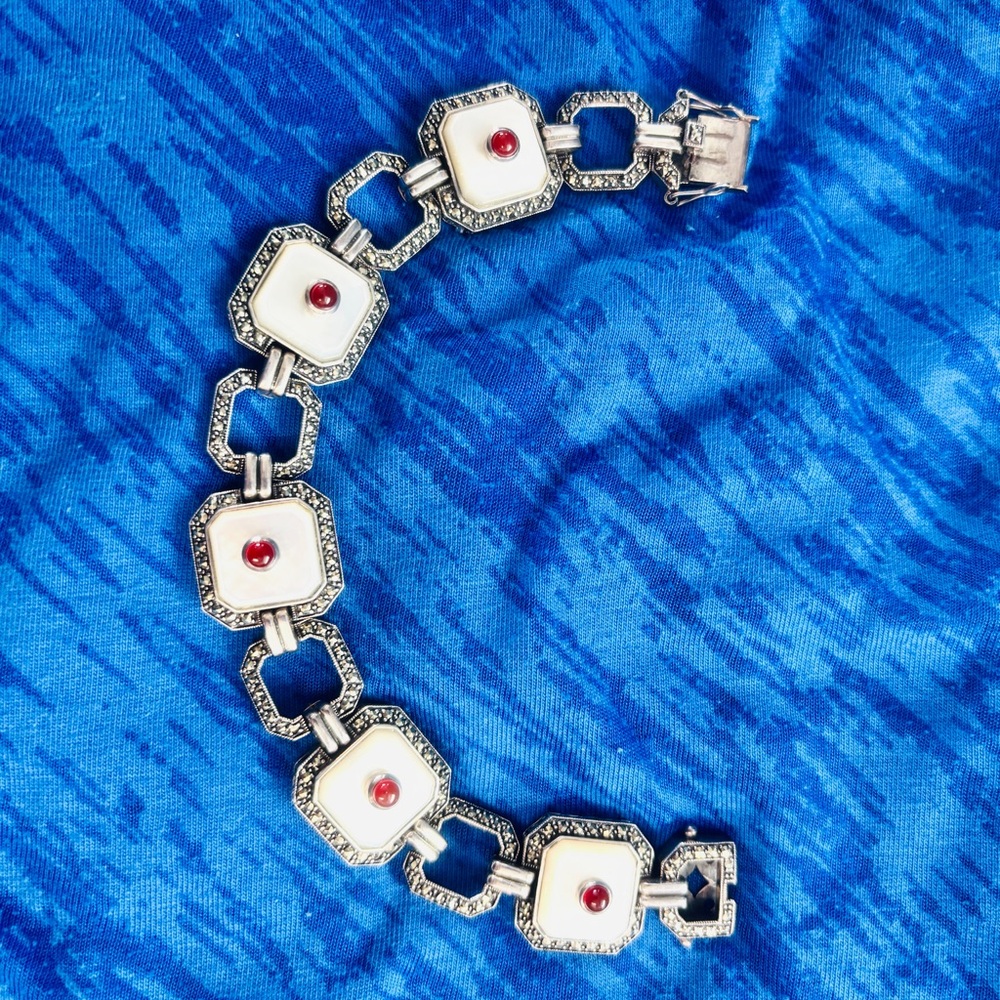 Elegant Silver and White Bracelet with Red Accents